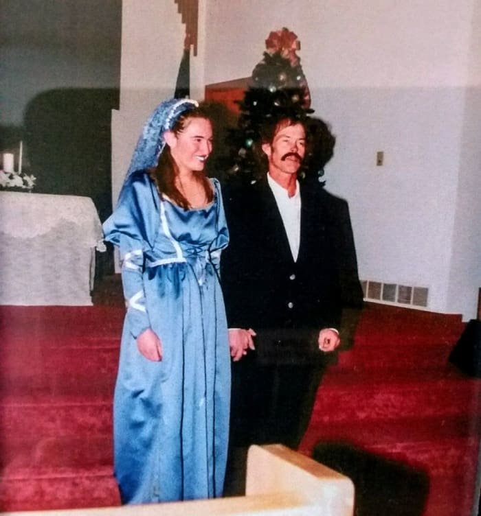 My mother and I made this gown, modifying a pattern we bought. It was an adventure, first designing the dress, finding the lavender blue satin, and stumbling across a pattern which was close to my ideal. But the memories are worth the trouble.