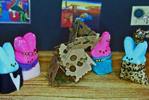 Children can make a diorama using figurines and other items they find around the house. This is a "Peeps at the Art Museum" diorama my family made several years ago.