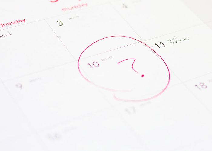 If you're not tracking your menstrual cycles or have irregular cycles, you might not be aware that you've missed your period—the most common first symptom of pregnancy.