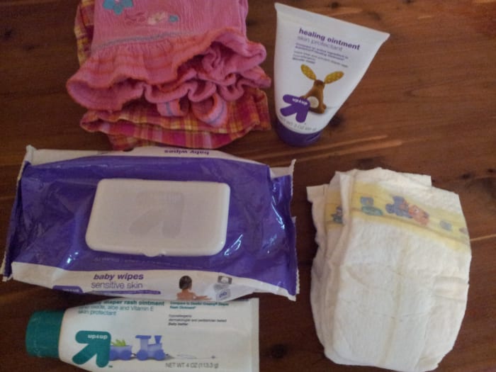 Have extra diapers, wipes, diaper rash cream, and clothes nearby when changing a diaper!