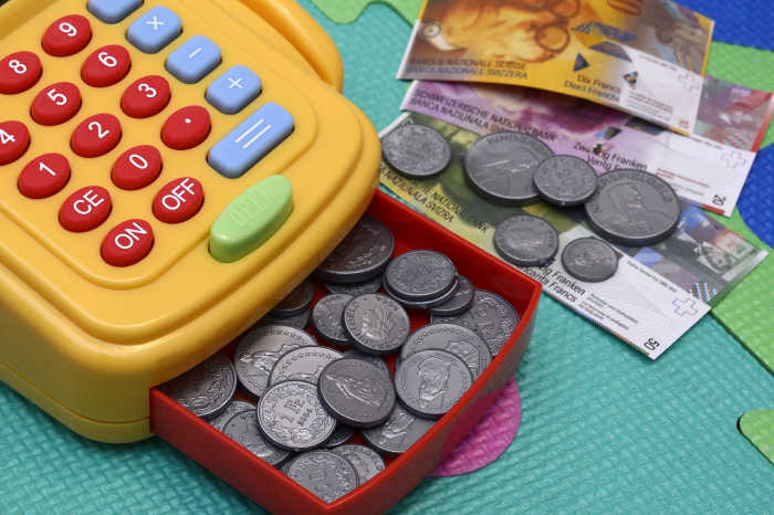 Make it fun for the kids to learn about money, and they'll grow up having a better feeling about bills, saving plans, and financial emergencies.