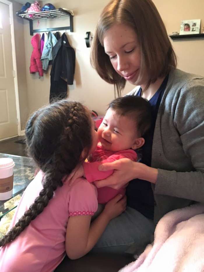 Taking care of older kids in addition to a newborn can be a whole new challenge. A baby wrap helped me survive the early months of having more than one child.