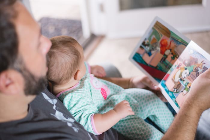 Reading with your baby before they fall asleep will help them to associate story time with sleepy time.