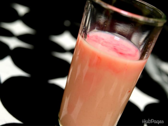 A cocktail of Hemorrhaging Brain, with strawberry liquor, irish cream, and grenadine, is haunting but tasty.