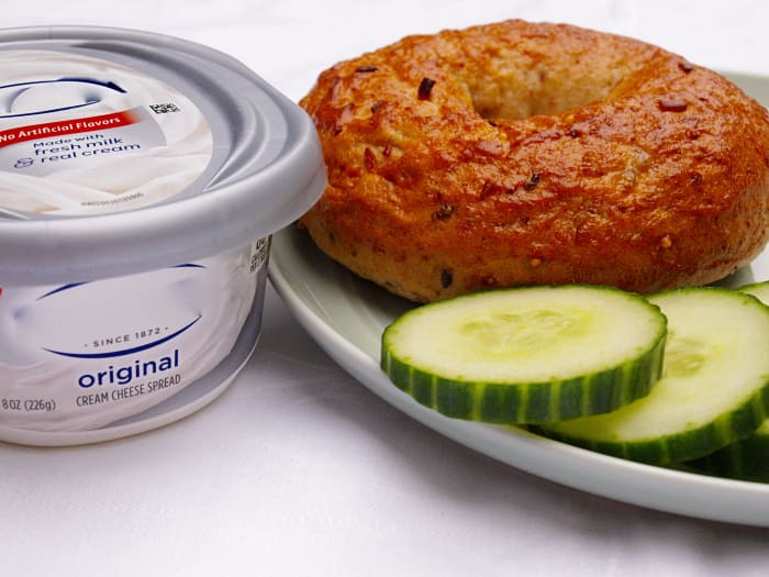 Spread a nice layer of cream cheese on each half of a toasted onion or garlic bagel, top with sliced cucumbers, and you've got a tasty sandwich.