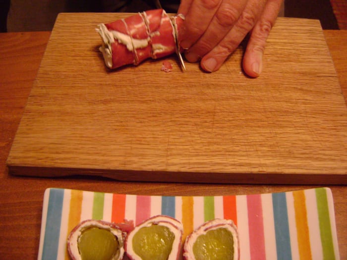 Using a serrated knife, cut each roll into slices that are 1/2 inch to 3/4 inch thick. Arrange on a serving platter and enjoy!