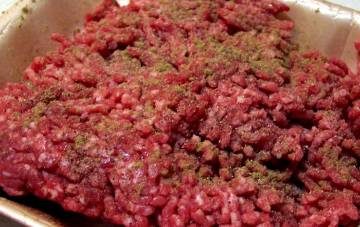 Use hands or fork to work in the salt, pepper, and any herb or spice into the ground meat.