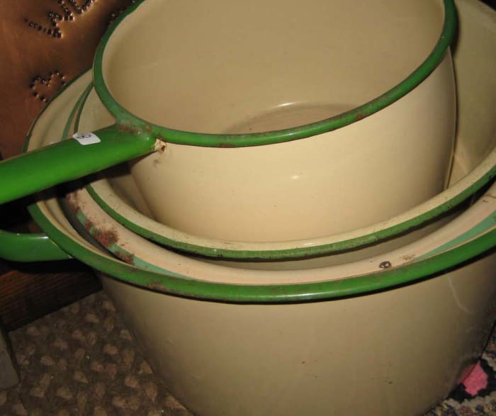 Cream with green trim is typical of vintage Swedish enamelware and can be used with caution. The large pot would be nice filled with ice and a few bottles of wine or lemonade.