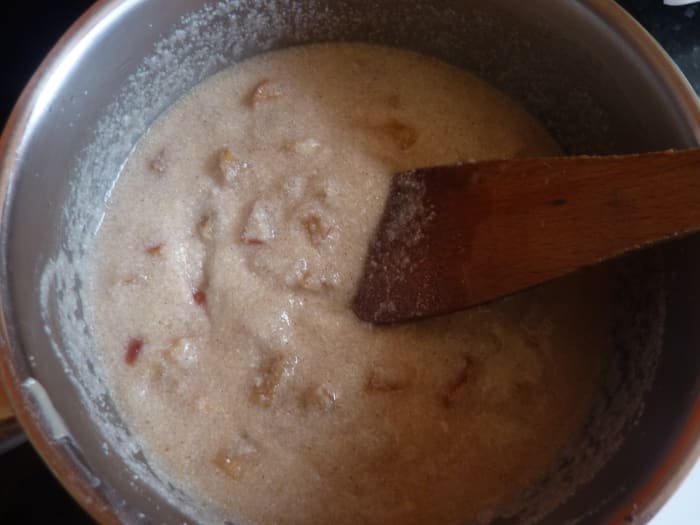 Soon the mixture starts to thicken. Stir to prevent burning, then turn heat down after a few minutes.