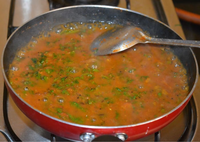Step seven: Add half a cup of water. Cover and simmer for 6 minutes. By this time, spinach will have cooked properly and blended with the spices.