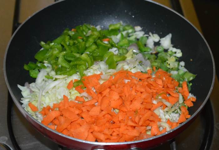 Step three: Throw in chopped veggies. Add some salt. Stir-cook them over high heat until they are soft yet retain some crunchiness.