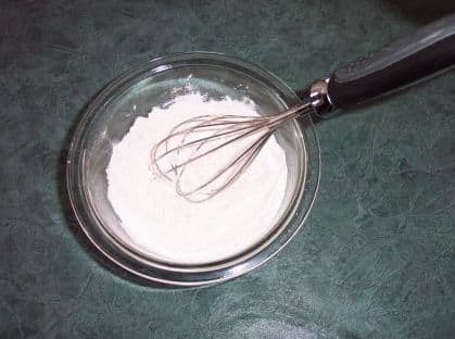 Whisking dry ingredients.