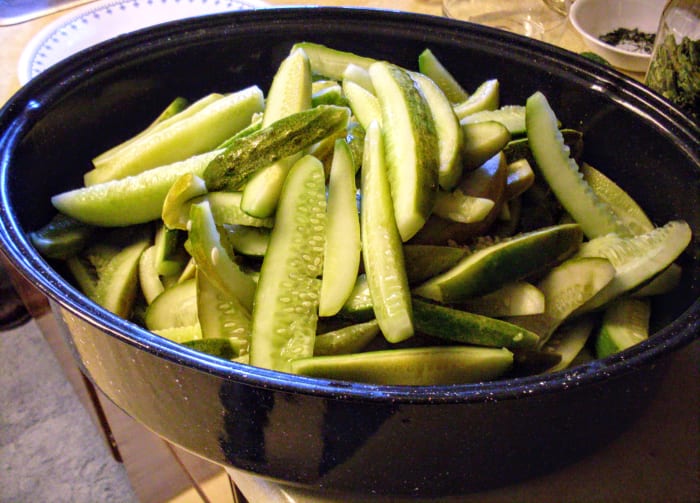 Set them in a large container (in this case, a roasting pan) which will be easy to reach into to grab small handfuls.