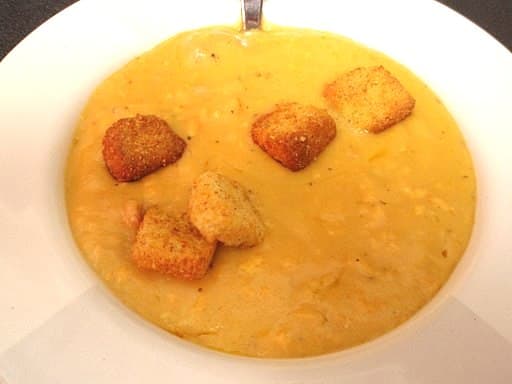 Cheese soup with crispy croutons. A delicious way to serve soup.
