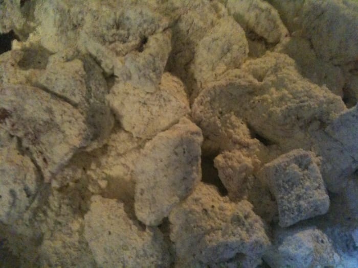 Dredge the trimmed beef in the seasoned flour. That simply means to toss the cubed beef in the flour, then shake off the excess flour.