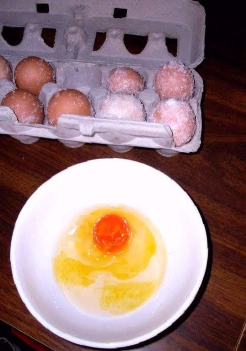 A somewhat dried egg . . . the yolk is a hard ball, and the white is watery and has lost some of its gloss. This egg is still OK for some baking applications, but don't try making scrambled eggs with such.