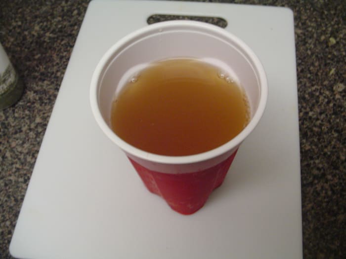 The completed drink is brown in color and is lightly carbonated (depending on whether or not you shook the fermenting container)