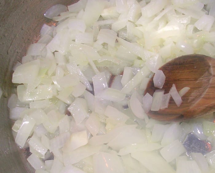 Onions cooking slowly in butter smell heavenly and look beautiful as they become translucent.