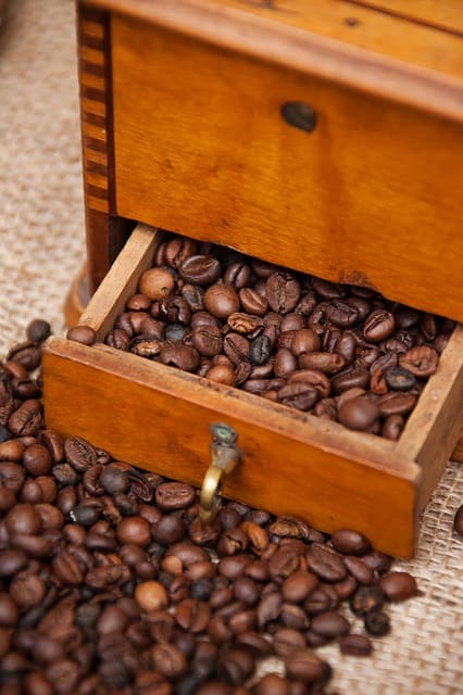 Generally speaking, you want to avoid storing exposed coffee beans for longer than two weeks. This usually means buying smaller portions of coffee, enough to last you just a week or so.