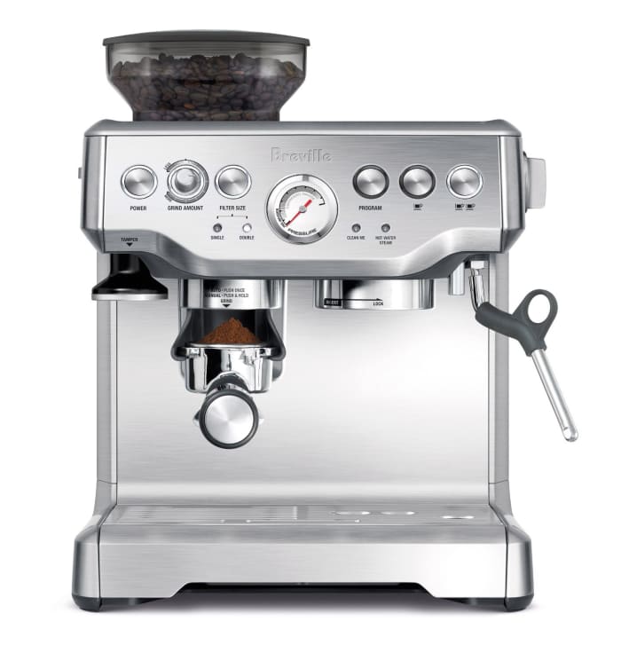The Breville Barista Express Espresso Machine. Constructed from stainless steel, it's easy to clean, attractive, solid and durable. It's not the cheapest grind and brew espresso machine out there, but worth every penny in my opinion and experience.