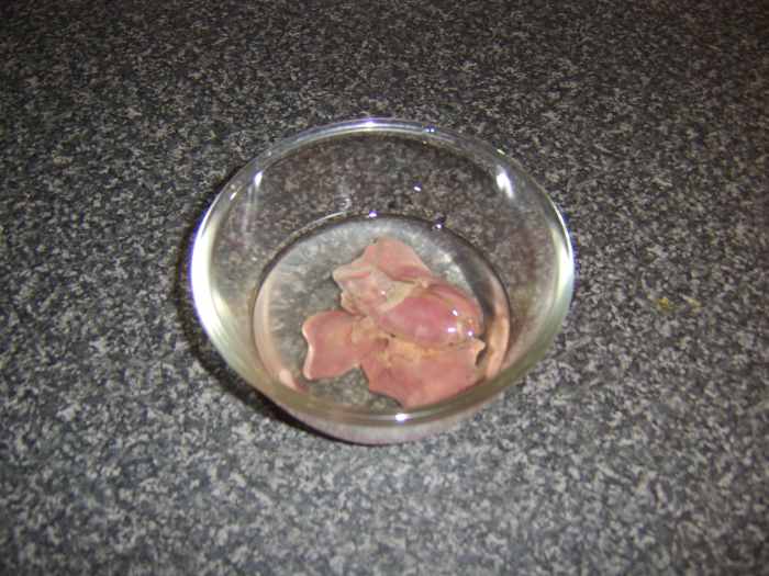 Chicken livers are steeped in cold water for fifteen minutes prior to being cooked to remove the excess blood