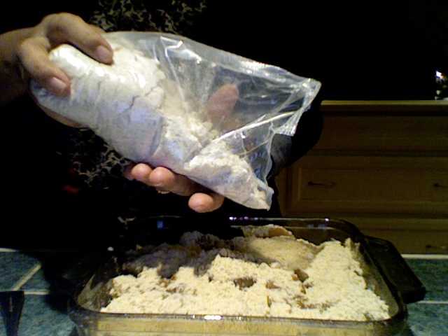 Evenly sprinkle 1/2 of the contents of the cake mix bag over the caramel apple mix.