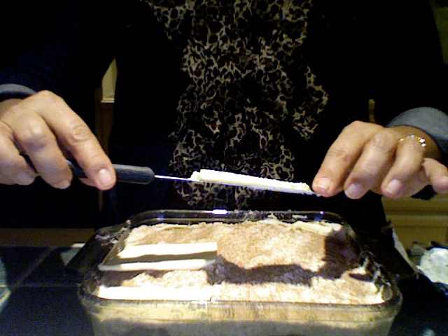Cut long and even slices of real butter and layer them over the mixture. Make sure the slices are thin and as even as possible.
