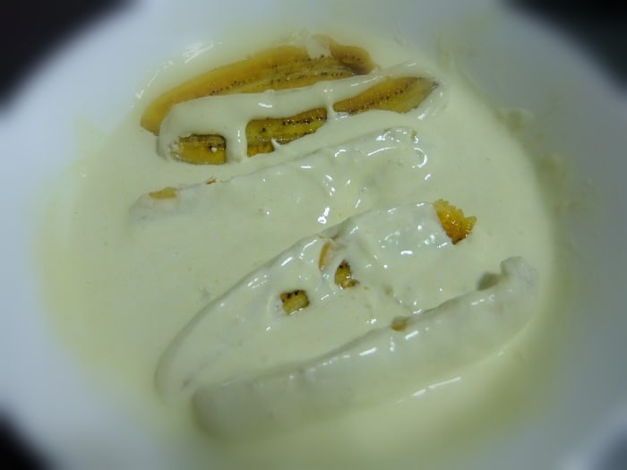Place the sliced bananas in the batter and leave for about 5 minutes before frying. This allows the baking powder to work its magic and gives you a crispier banana fritter.