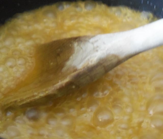 The mix should be bubbling nicely. You are looking for large, thick bubbles and for all the sugar to have dissolved.