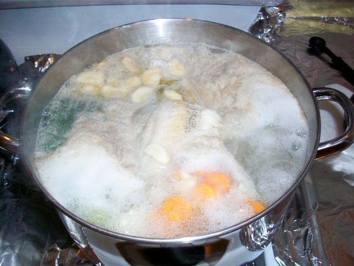 Once the soup starts to boil, cover it most of the way and turn it to medium or medium low to simmer.