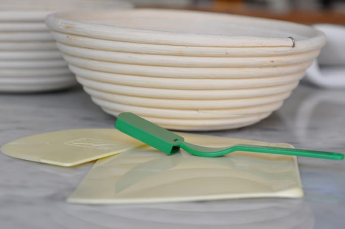 My bread making tools - dough scraper and dough blade; slashing knife known as lame; and proofing basket (known as banneton). Image: © Siu Ling Hui