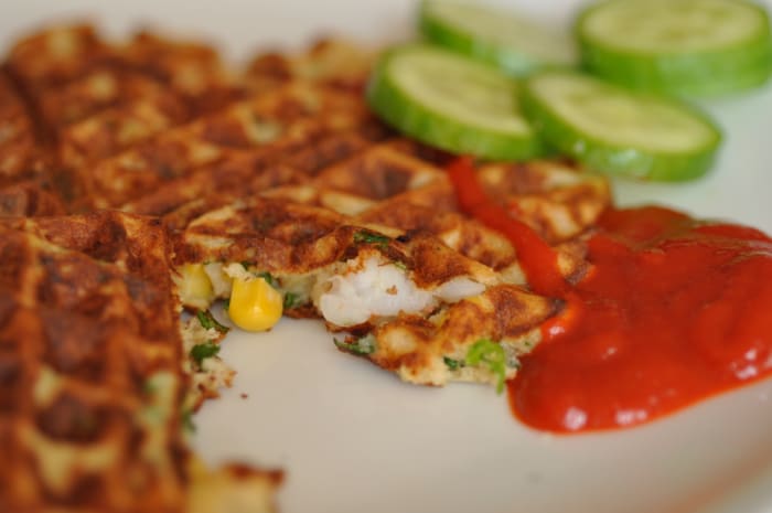 Prawn, sweetcorn, coriander and chilli sourdough waffles. Served with Sriracha chilli sauce. Image: © Siu Ling Hui