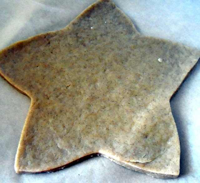 Roll out the dough and cut out the star shapes. Place on baking sheets lined with parchment and bake in the oven.