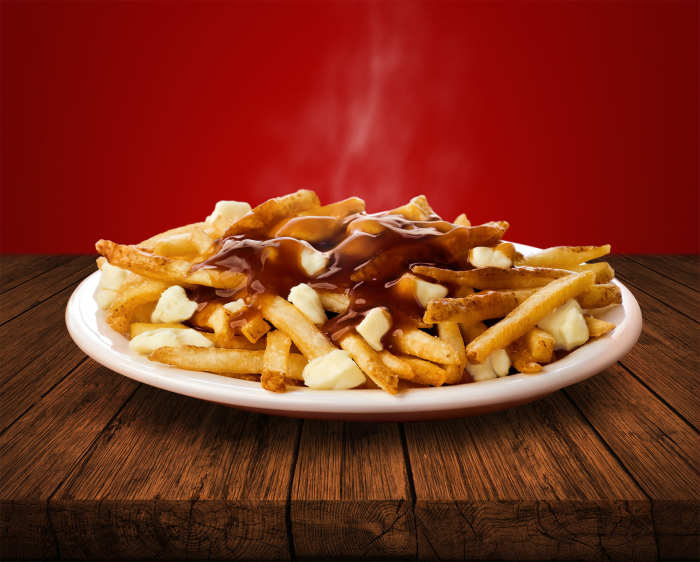 This is a promo photo of Wendy's poutine. "The delicious marriage of flavours melts together to create a truly Canadian favourite."