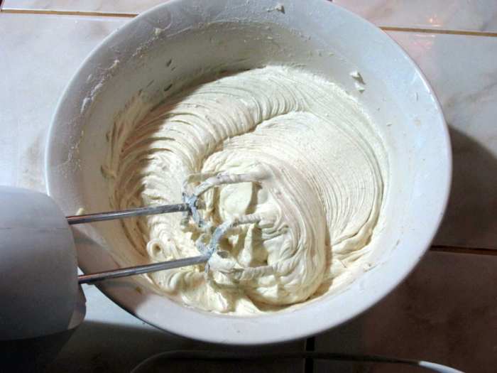Using a hand or stand mixer, gradually add powdered sugar and whip until fluffy.