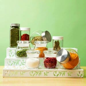 Spice jars organized on stairs