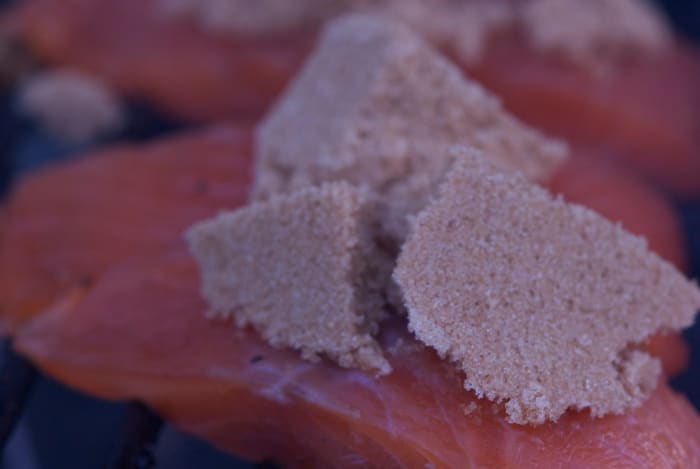 I love the Yukon Candy Salmon at Whole Foods. It is a very sweet smoked salmon. I added some brown sugar to the BGE in the hopes that it would slowly melt into the salmon pieces. It did quite wonderfully!