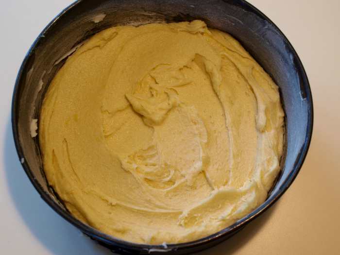 Spoon the dough into the prepared pan, making sure to spread it evenly. Remember that it is not a lot of dough, but it will rise.