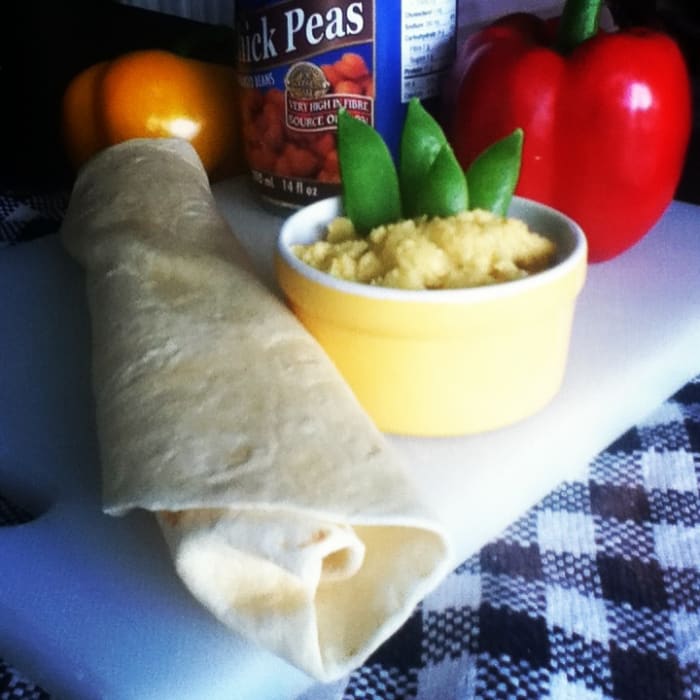This healthy hummus recipe is quick and easy to make. Serve it as veggie or chip dip. Spread it on pita, tortillas, or sandwiches.