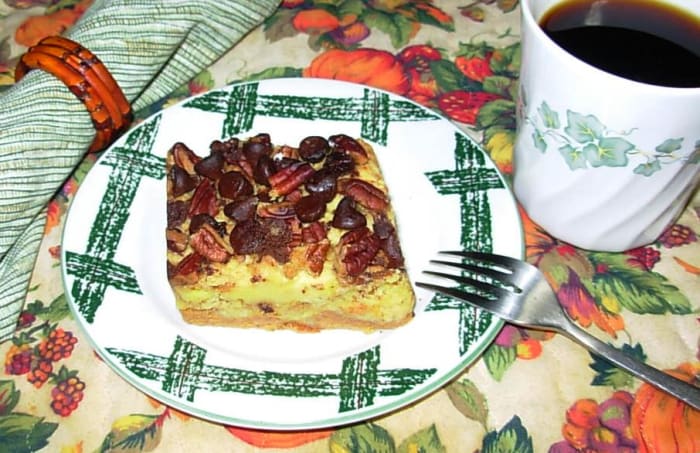 Pumpkin-pie-cake with chocolate pecan toping is a quick and easy to make. There's a layer of pumpkin pie filling on the bottom, then a layer f cake, and then it is topped with chocolate and pecans.