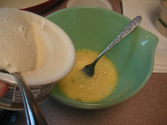 Fifteen ounce container of Ricotta, eight ounces of shredded Mozzarella, a cup of shredded Parmesan cheese and two eggs.