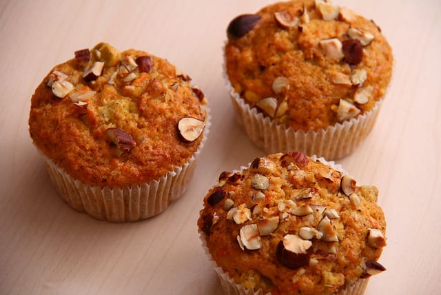 Muffins are a delicious treat and can be made more nutritious by adding grated vegetables to the mixture.