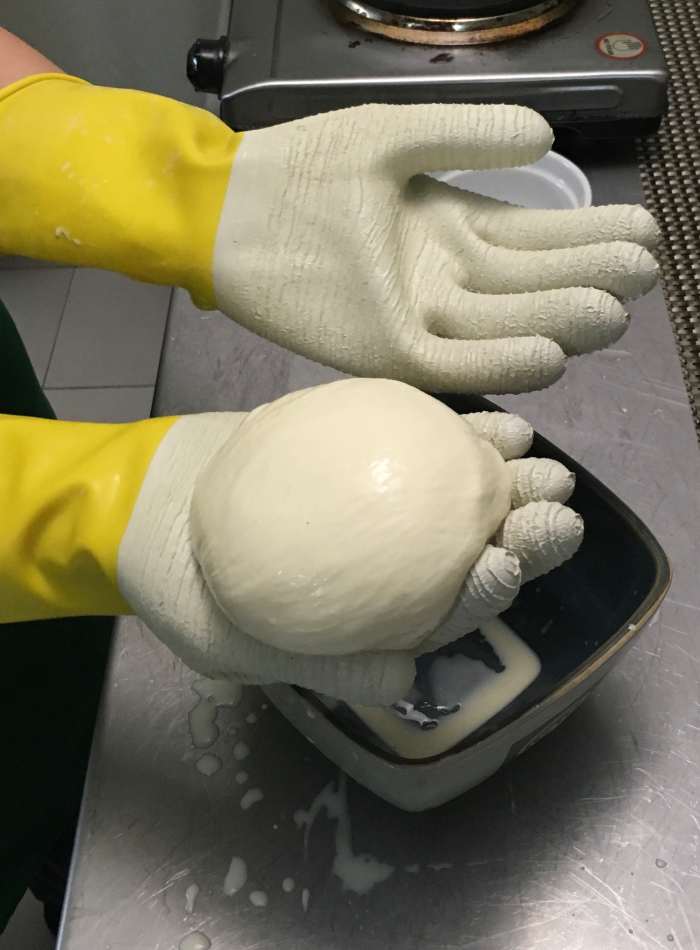 Heat the cheese another 30-60 seconds and stretch, until cheese can be formed into a ball.