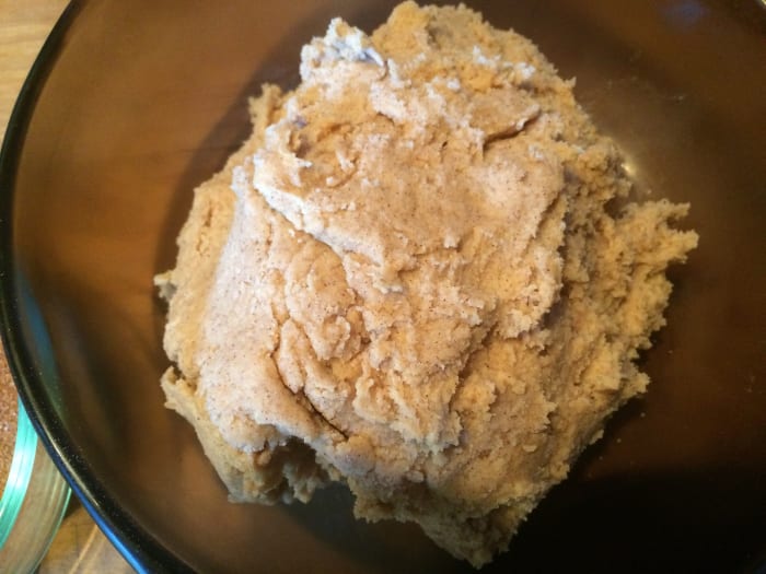 Slowly begin to add the dry mix into the wet ingredients. Continuously stirring until you have used it all. Once cookie dough is formed, refrigerate for 10 minutes.