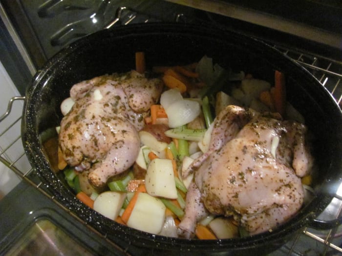 Once you've rinsed the chicken, pat dry and rub with olive oil and spices. Set chicken on top of diced vegetables and potatoes. Bake at 375 degrees.
