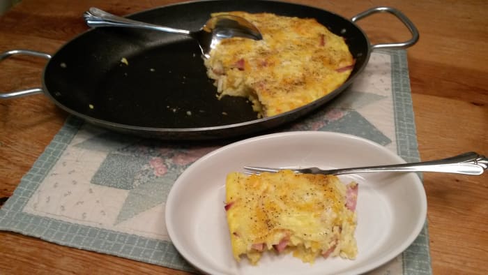 Breakfast bacon casserole being served.