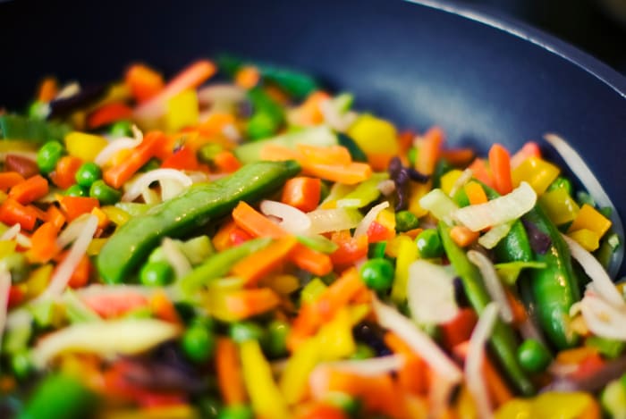 A paella pan doubles as a wok