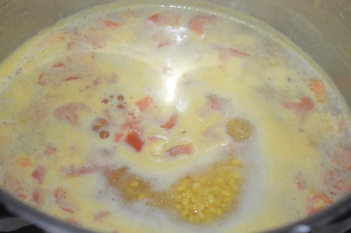 Step six: Boil the mix for 2 minutes. Cover the cooker lid. Cook up to 2 whistles and simmer for 3 minutes. Turn off the fire.