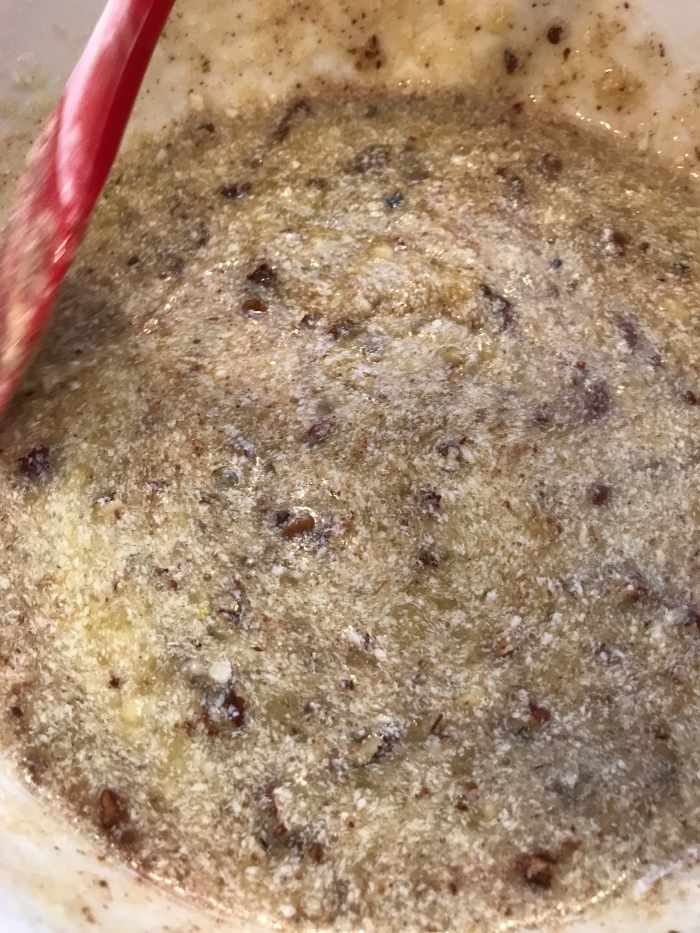 One of the biggest points about making quick bread (like banana bread) and having it turn out moist and tender, is to stir as little as possible after adding flour. So making sure all the other ingredients are well mixed first is key.
