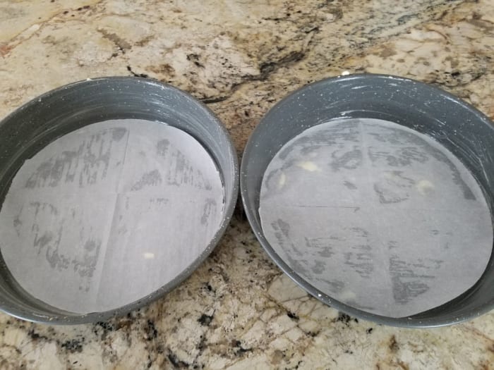 I cut out a sheet of parchment to fit the bottom of the pan and grease it with my butter alternative just before placing the parchment on the pan. Make sure to grease the sides, too.